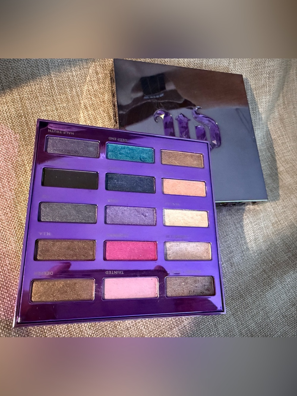 Urban Decay Eyeshadow Palette — Teal, Purple, Pink, Bronze, Black